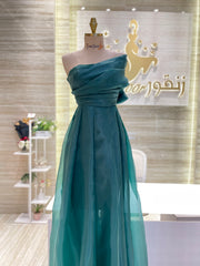 Custom-made party dress designed to flatter your figure.